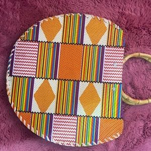 African printed oval bag with bamboo handles
